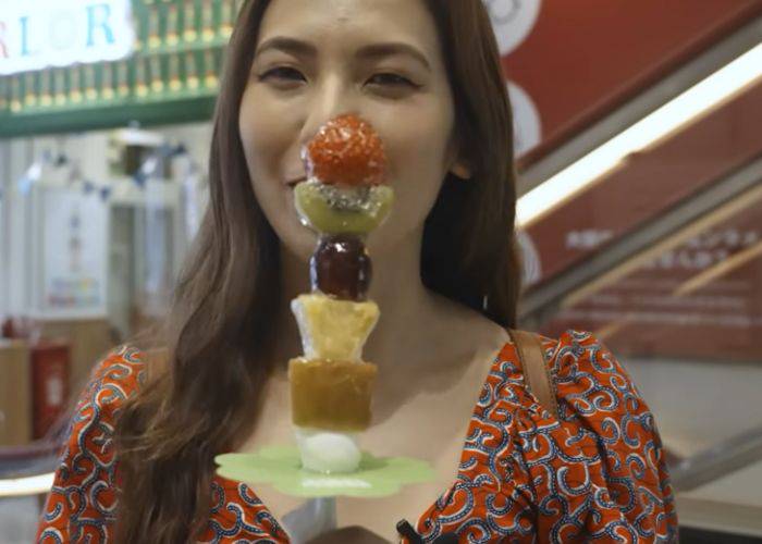 The “candy tree” candied fruit skewers at Taro's Parlor, featuring different skewered fruits covered in sugar.